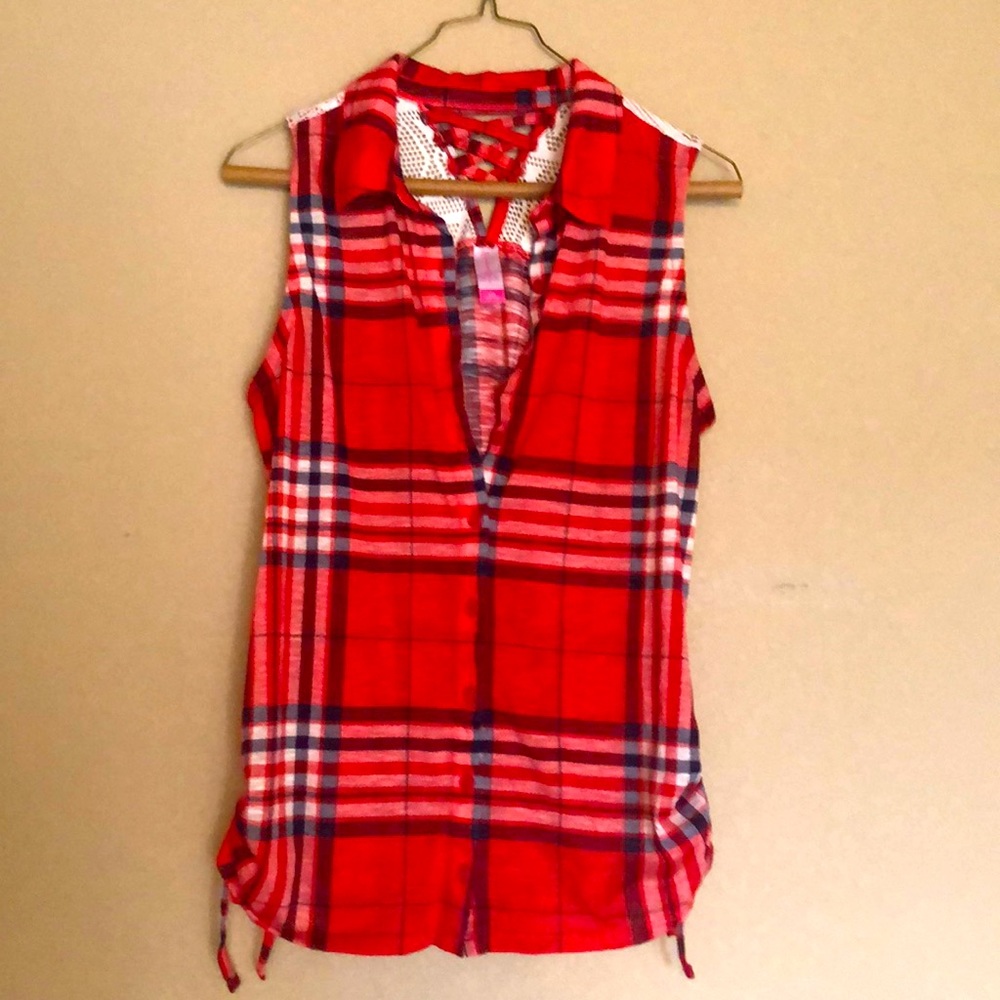 Sleeveless, button down shirt